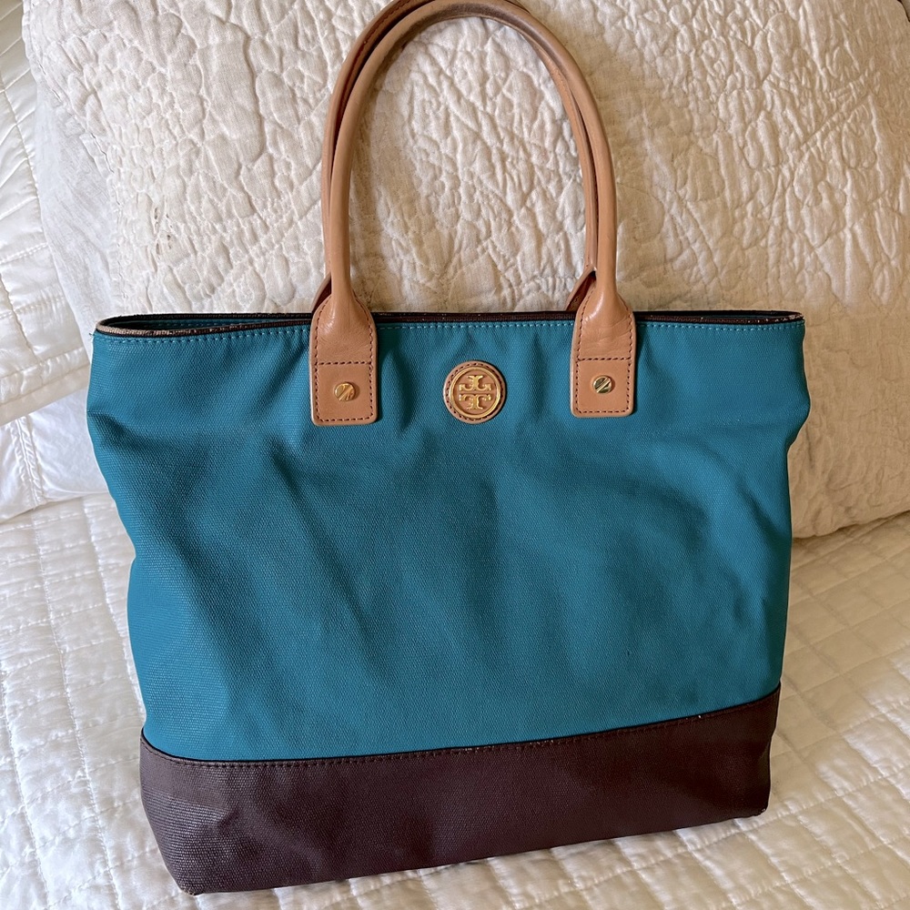 Small Tory Burch tote.  Performance fabric, 13” wide x  12” tall.